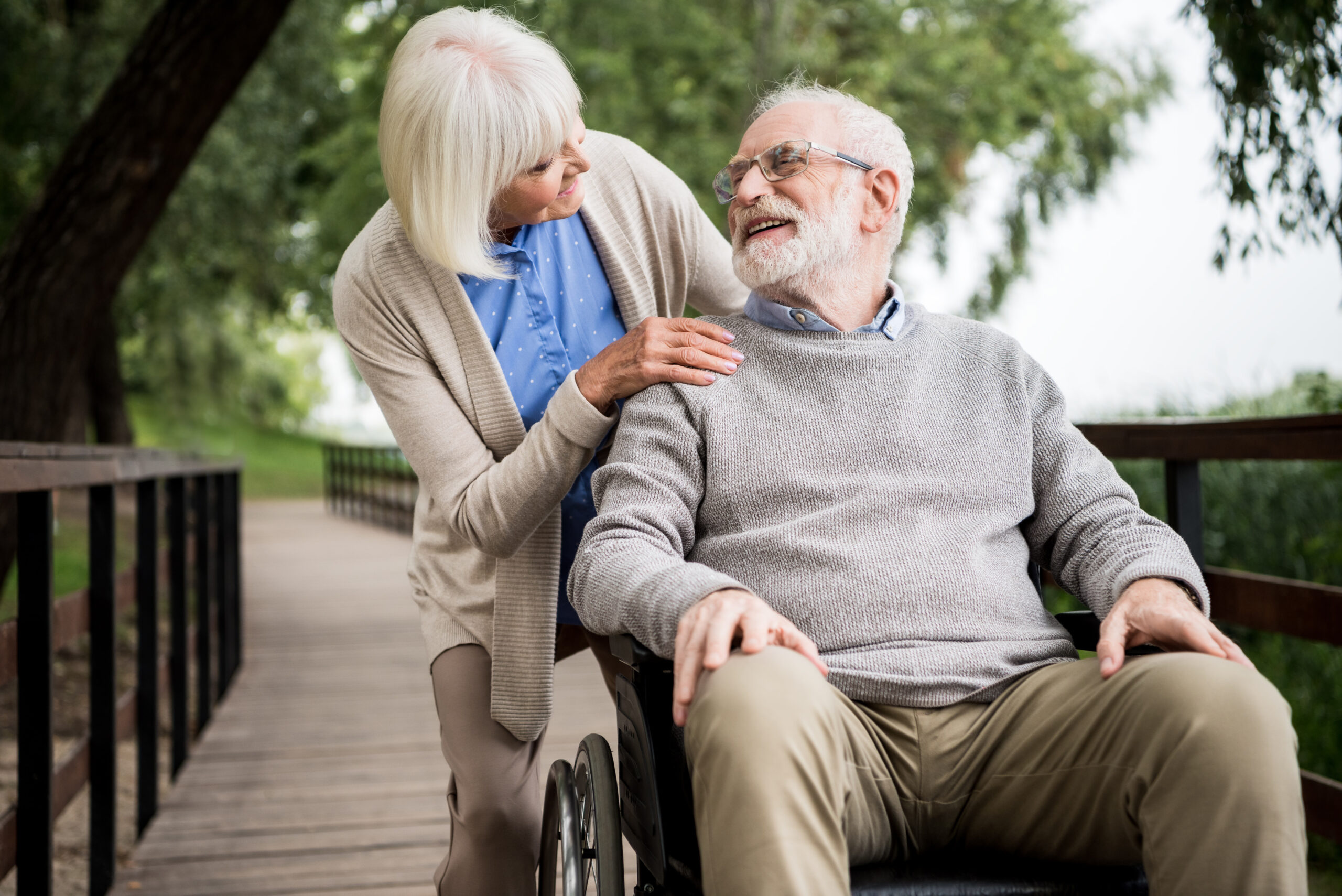 Home health worker helping a senior at home after hospital discharge